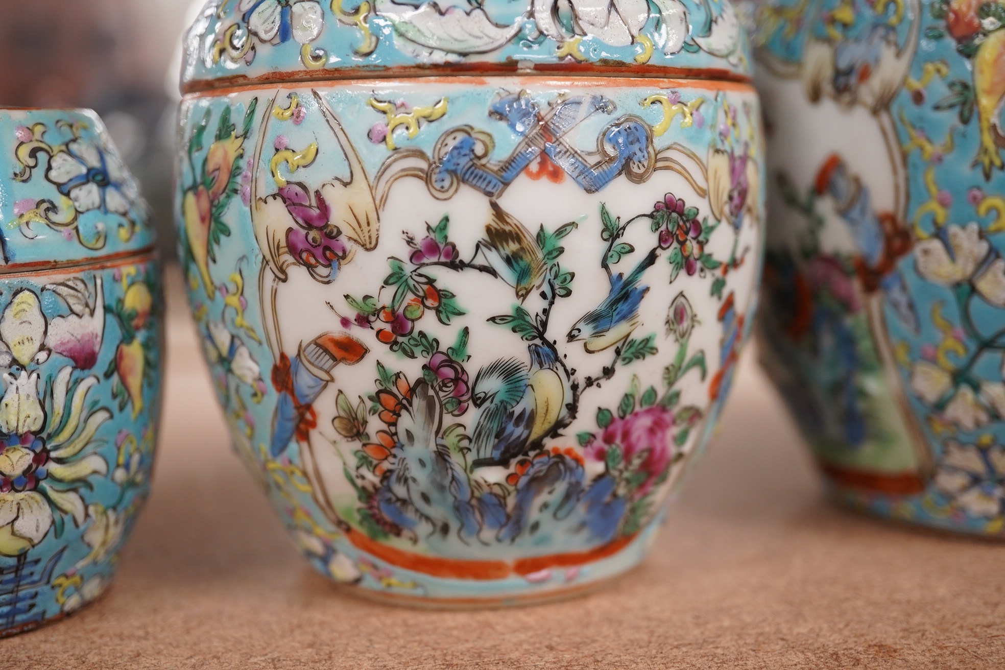 A complete Chinese porcelain nest of five enamelled porcelain barrel shaped boxes, c.1900, largest 12cm high. Condition - fair, some minor chipping